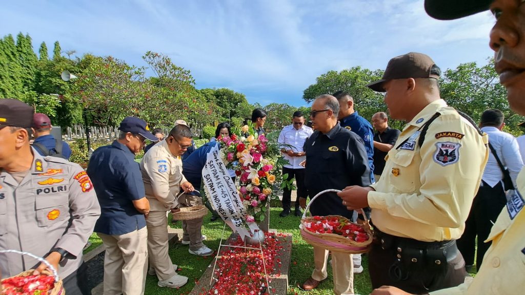 tabur bunga hut satpam